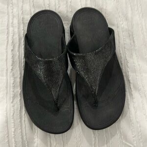 Size 7, Euro 38, Fit Flop in Black Lulu, shimmer suede. Worn around house ONCE!